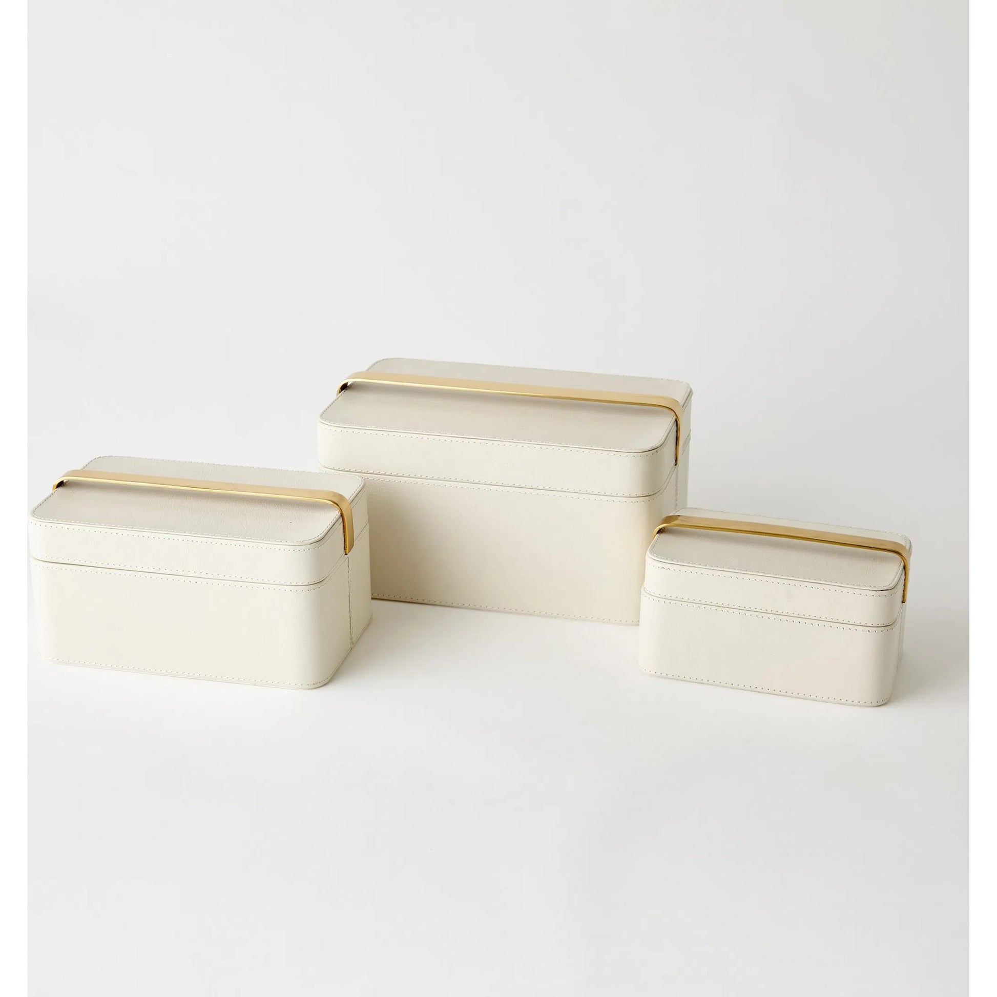 Avery Decorative Box by Global Views in milk. Made from mdf, vegetable tanned leather, polysuede lining, brass in a modern style.
