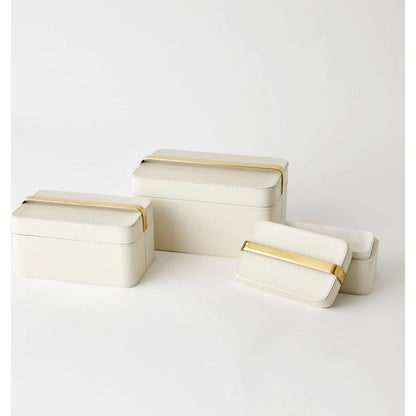 Avery Decorative Box by Global Views in milk. Made from mdf, vegetable tanned leather, polysuede lining, brass in a modern style.