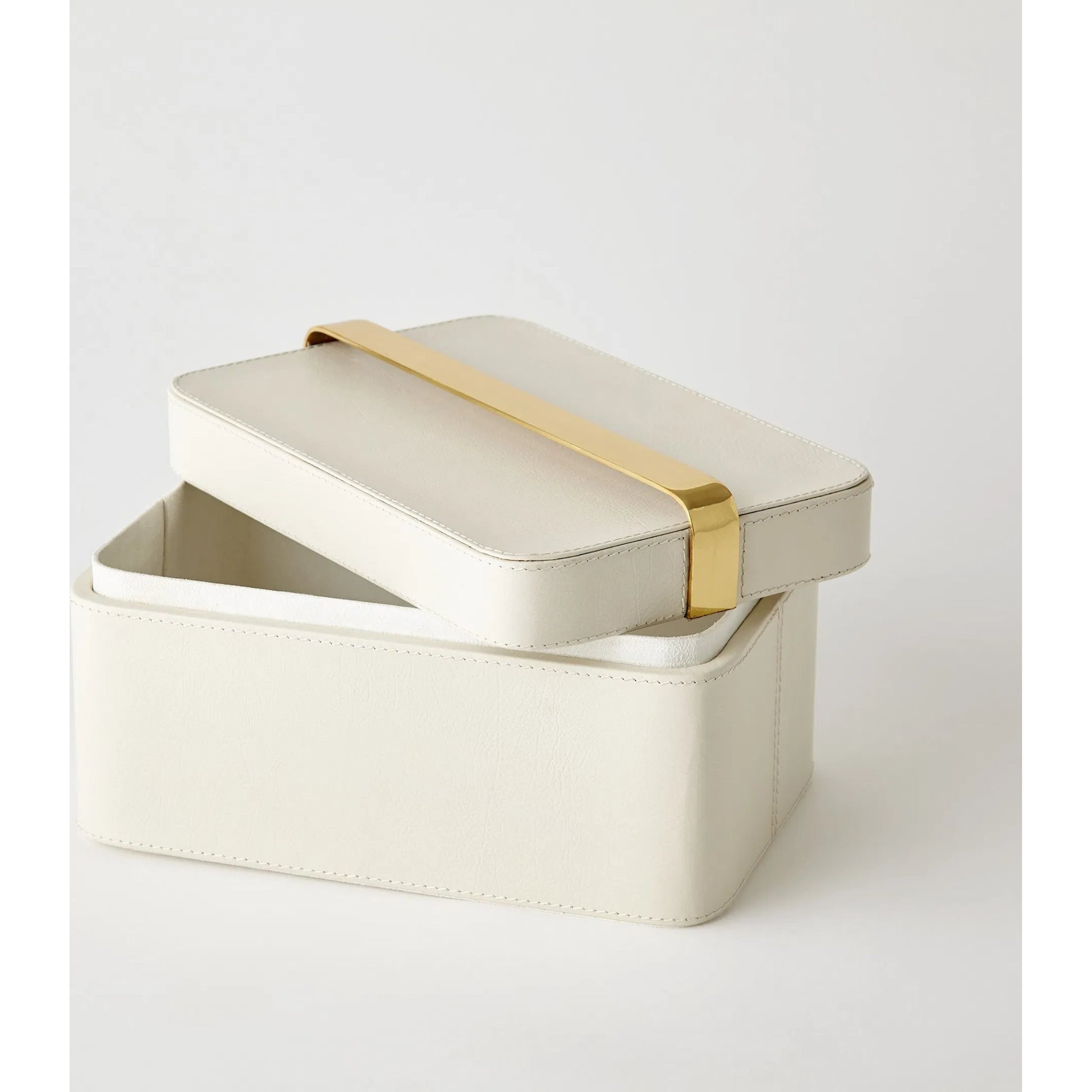 Avery Decorative Box by Global Views in milk. Made from mdf, vegetable tanned leather, polysuede lining, brass in a modern style.