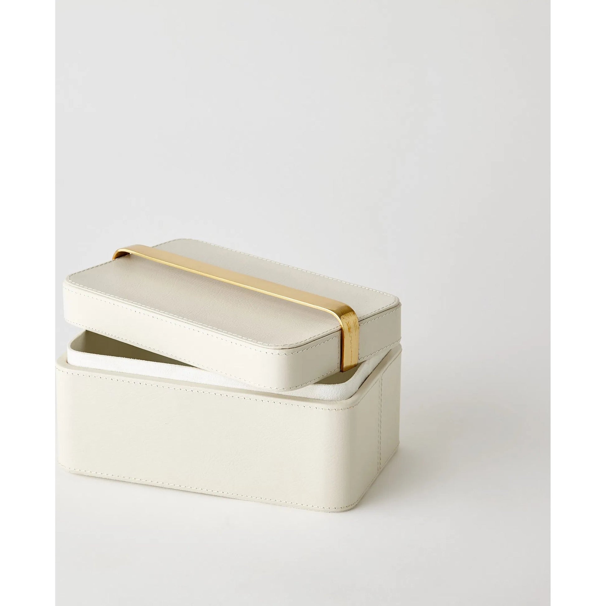 Avery Decorative Box by Global Views in milk. Made from mdf, vegetable tanned leather, polysuede lining, brass in a modern style.