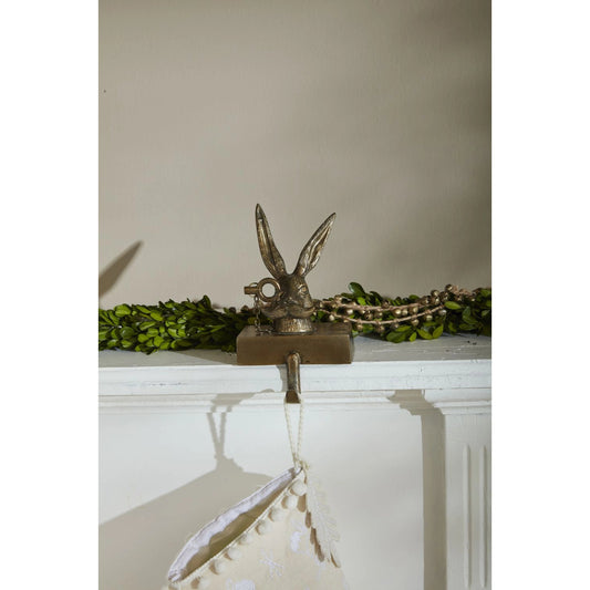 E+E Stocking Holder Eric by Accent Decor in antique-gold. Made from metal in a modern style.