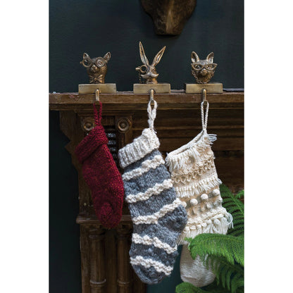 E+E Stocking Holder Eric by Accent Decor in antique-gold. Made from metal in a modern style.