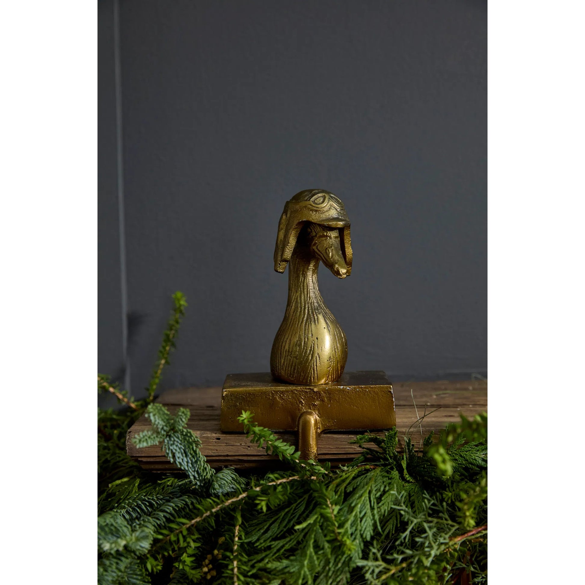 E+E Stocking Holder Charlie by Accent Decor in antique-gold. Made from metal in a unique style.