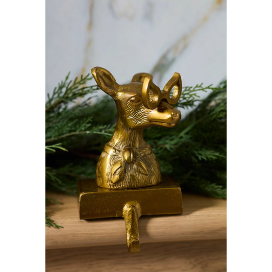 E+E Margie Stocking Holder by Accent Decor in antique, gold. Made from metal in a unique style.