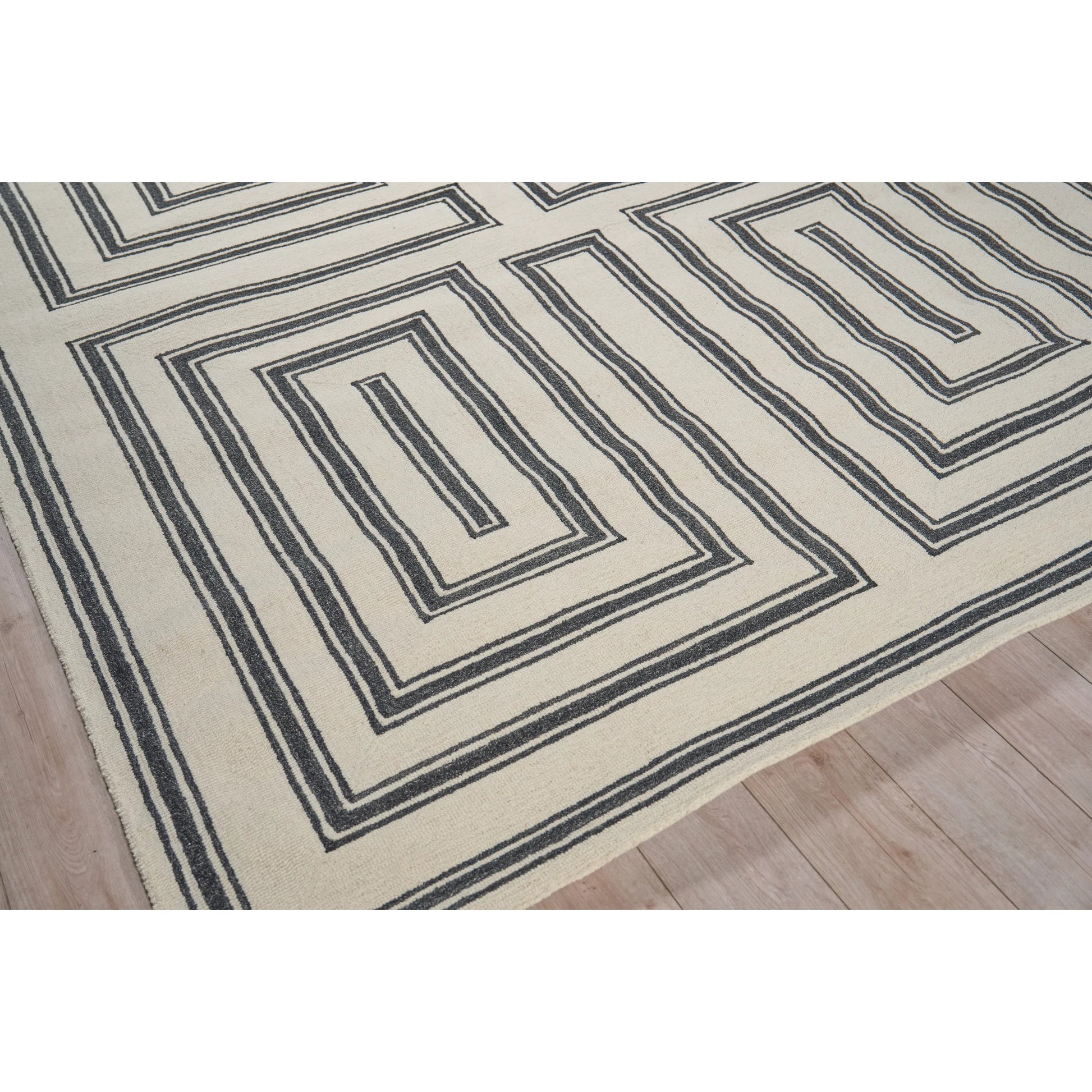 Studio 7531 Rug by Exquisite Rugs in ivory, black. Made from new zealand wool in a unique style.