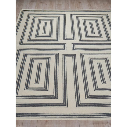 Studio 7531 Rug by Exquisite Rugs in ivory, black. Made from new zealand wool in a unique style.
