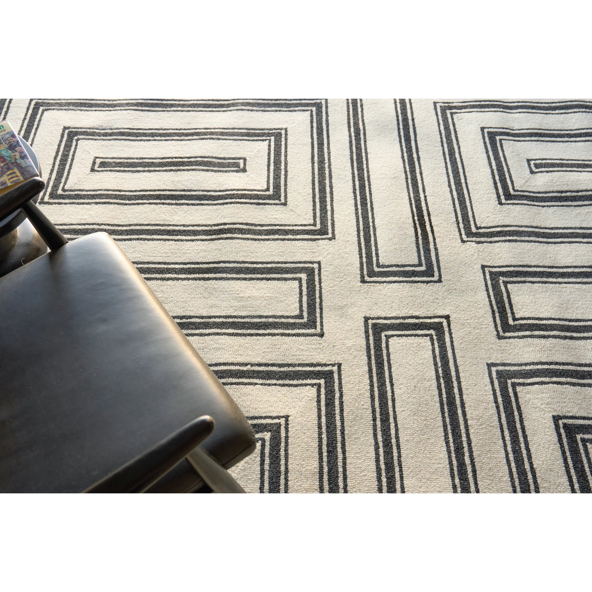 Studio 7531 Rug by Exquisite Rugs in ivory, black. Made from new zealand wool in a unique style.
