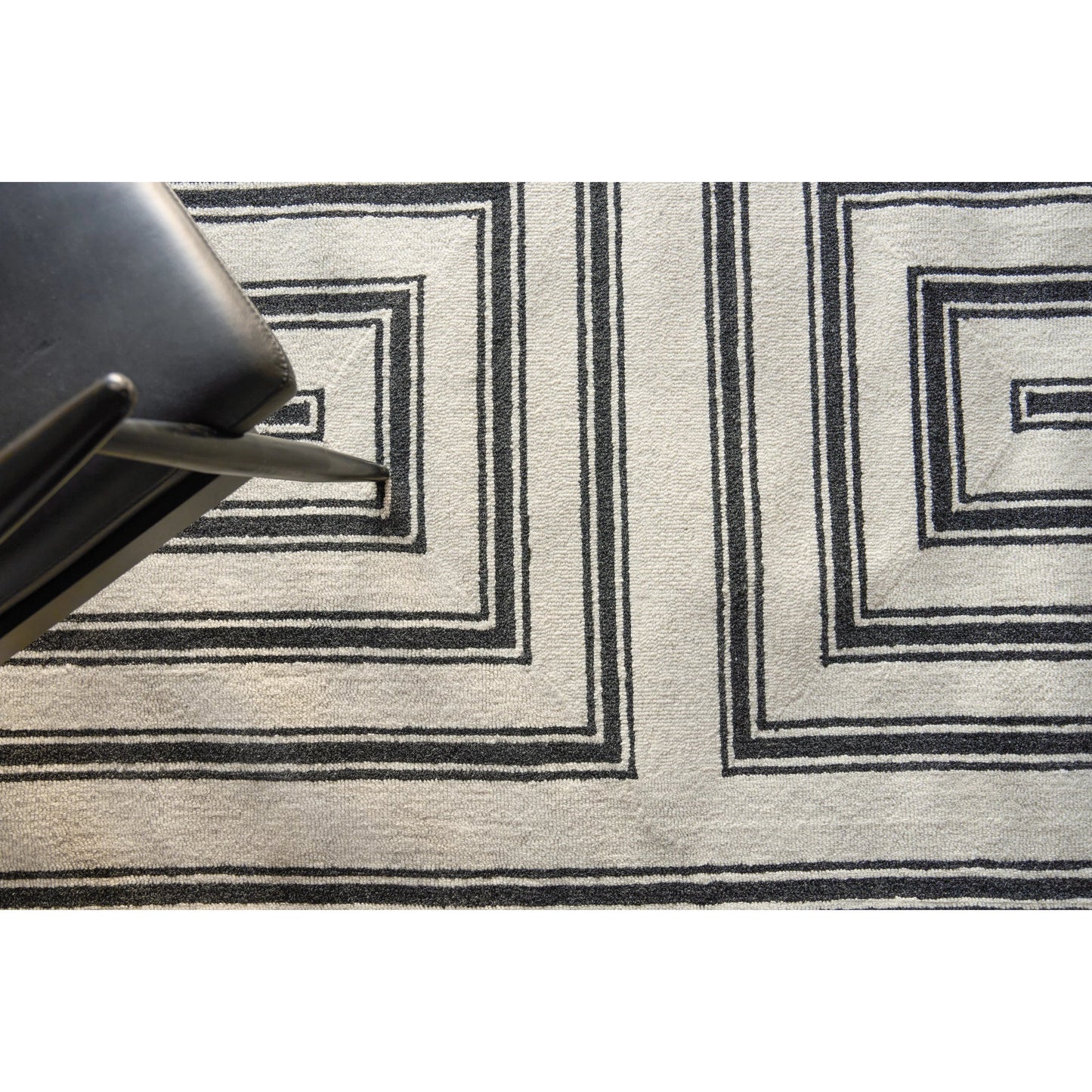 007 SI-2543822,SI-2543828,SI-2543829 | Lifestyle | Studio 7531 Rug by Exquisite Rugs in ivory, black. Made from new zealand wool in a unique style.