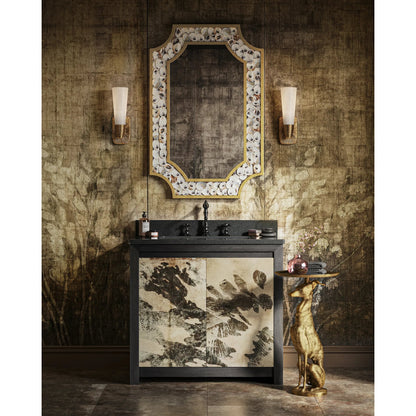 Ballyregan Accent Table by Currey and Company in antique brass. Made from cast aluminum in a modern style.