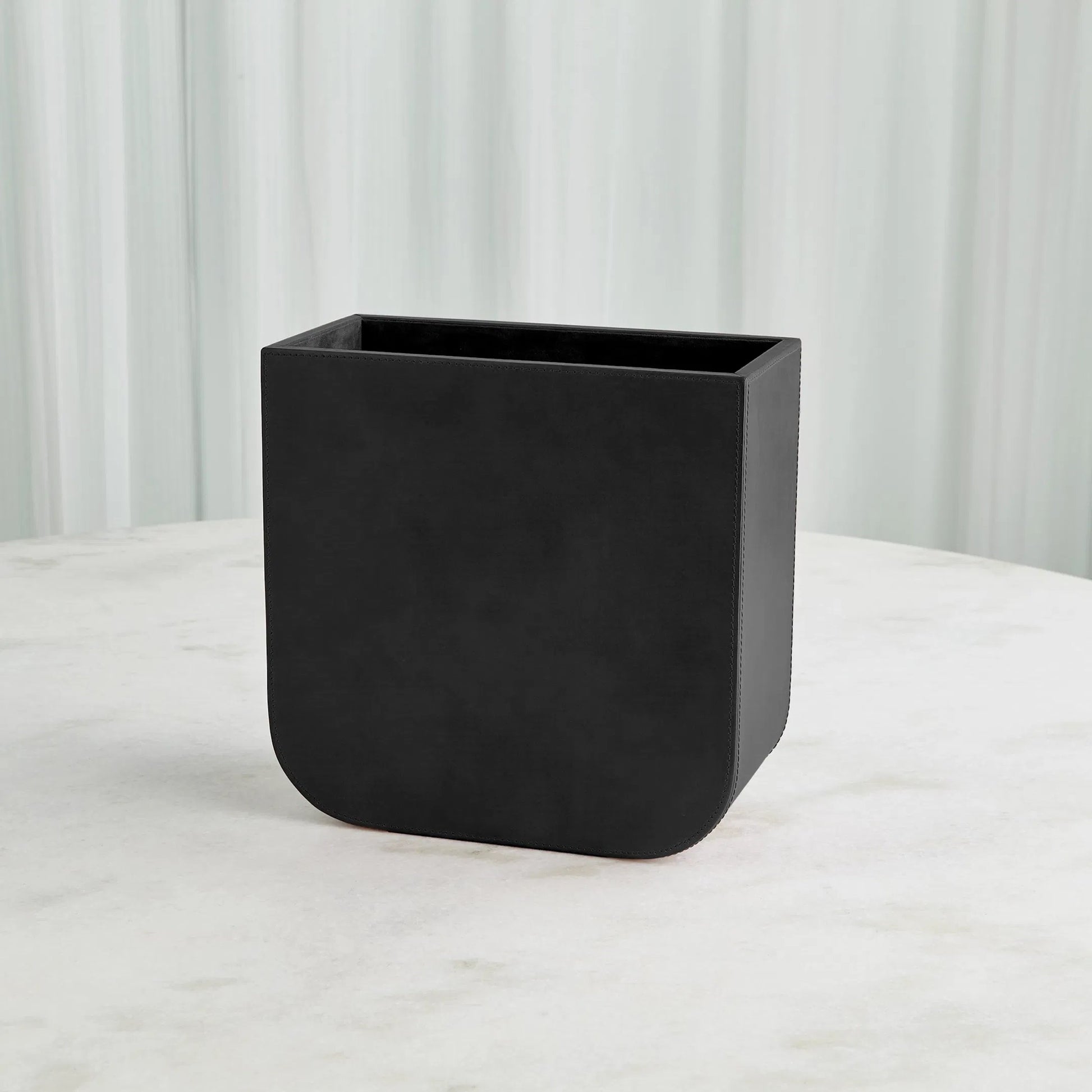 Radius Edge Leather Wastebasket by Global Views. Made from unique in a transitional style.