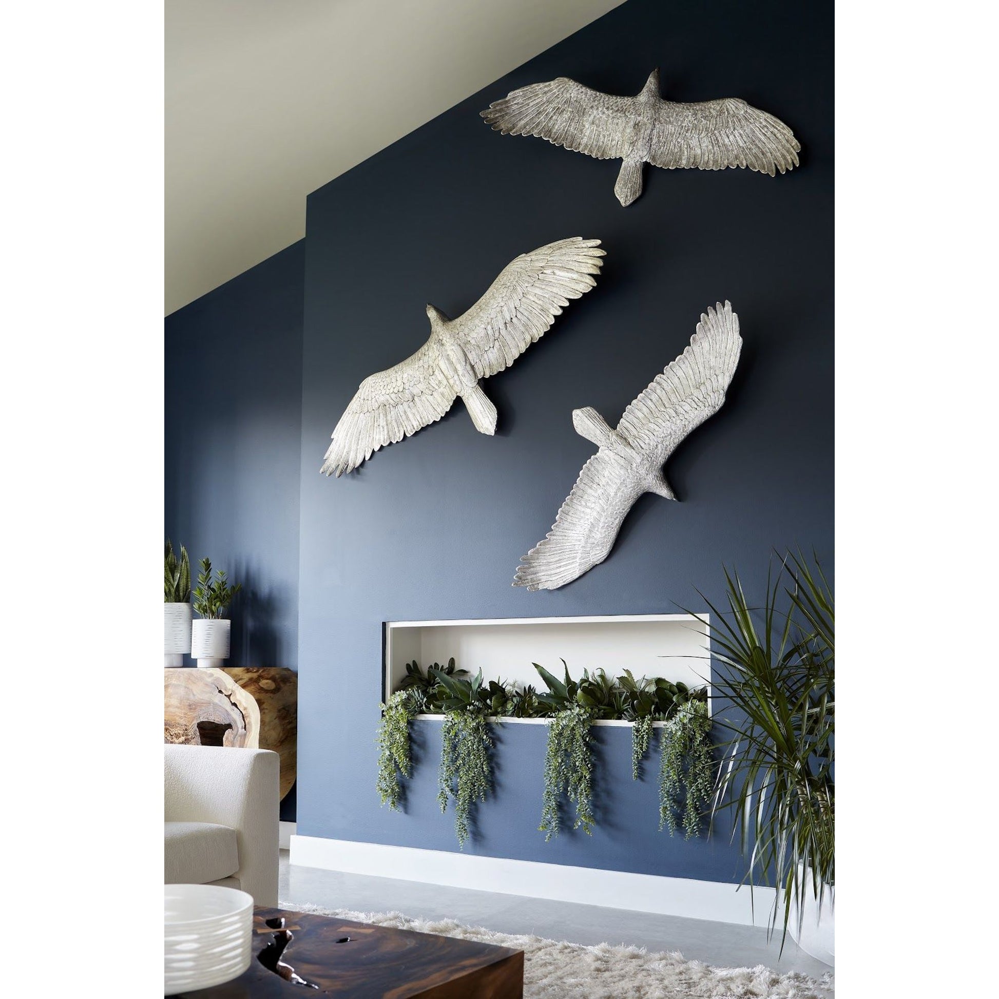 Soaring Eagle Wall Art by Phillips Collection in silver and silver leaf. Made from resin in a eclectic & global style.