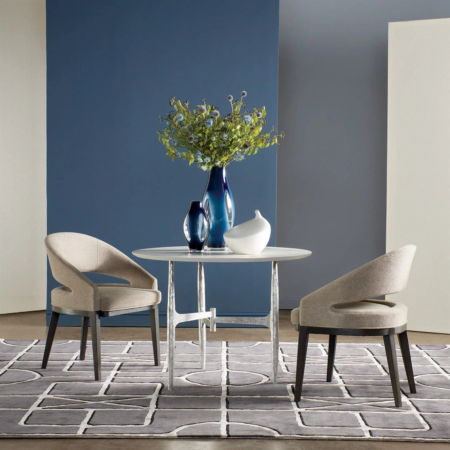 015 SI-2324251,SI-2324252 | Lifestyle | Radius Round Table by Global Views in white and marble. Made from unique in a modern style.