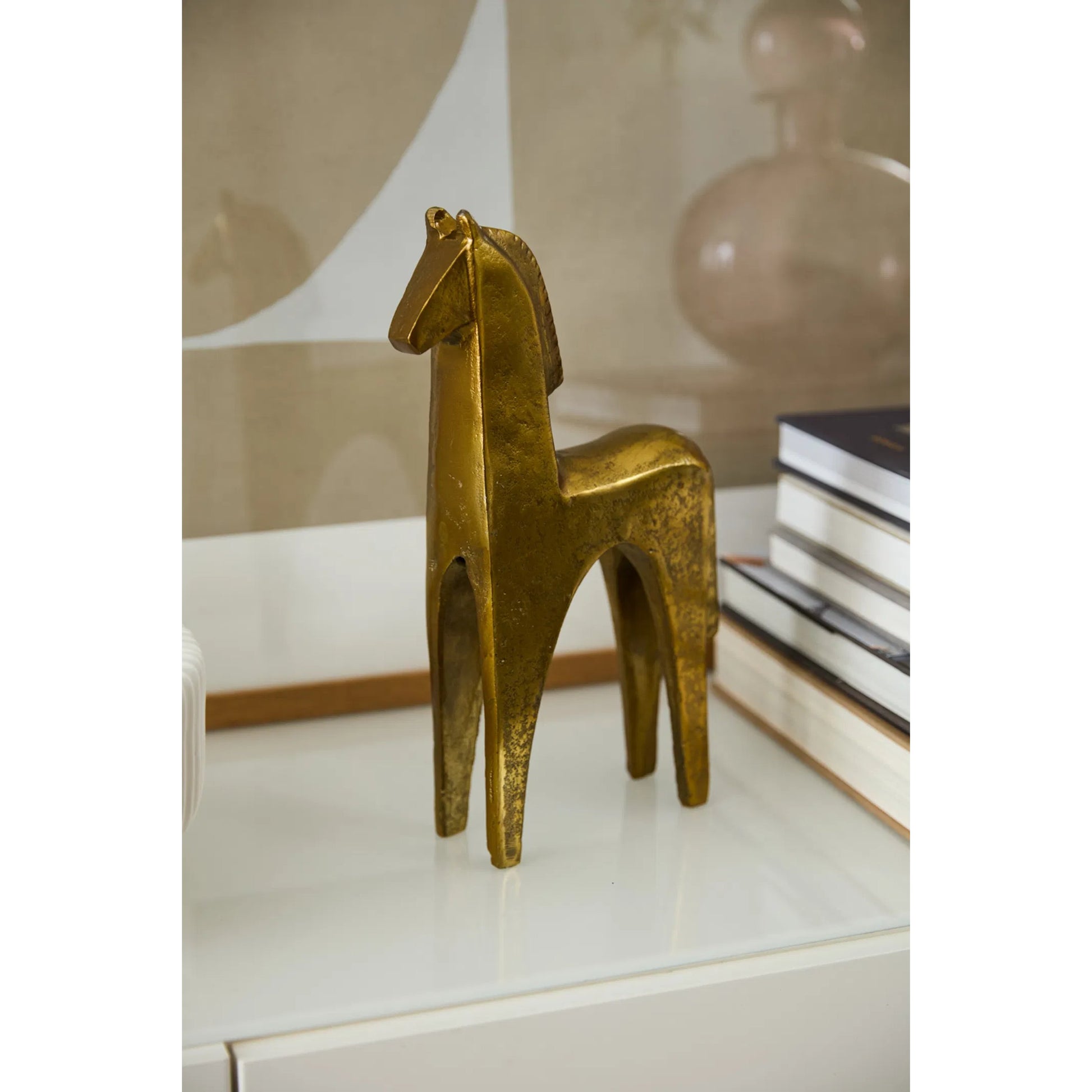 Arabian Figurine by Accent Decor in antique, gold. Made from metal in a unique style.