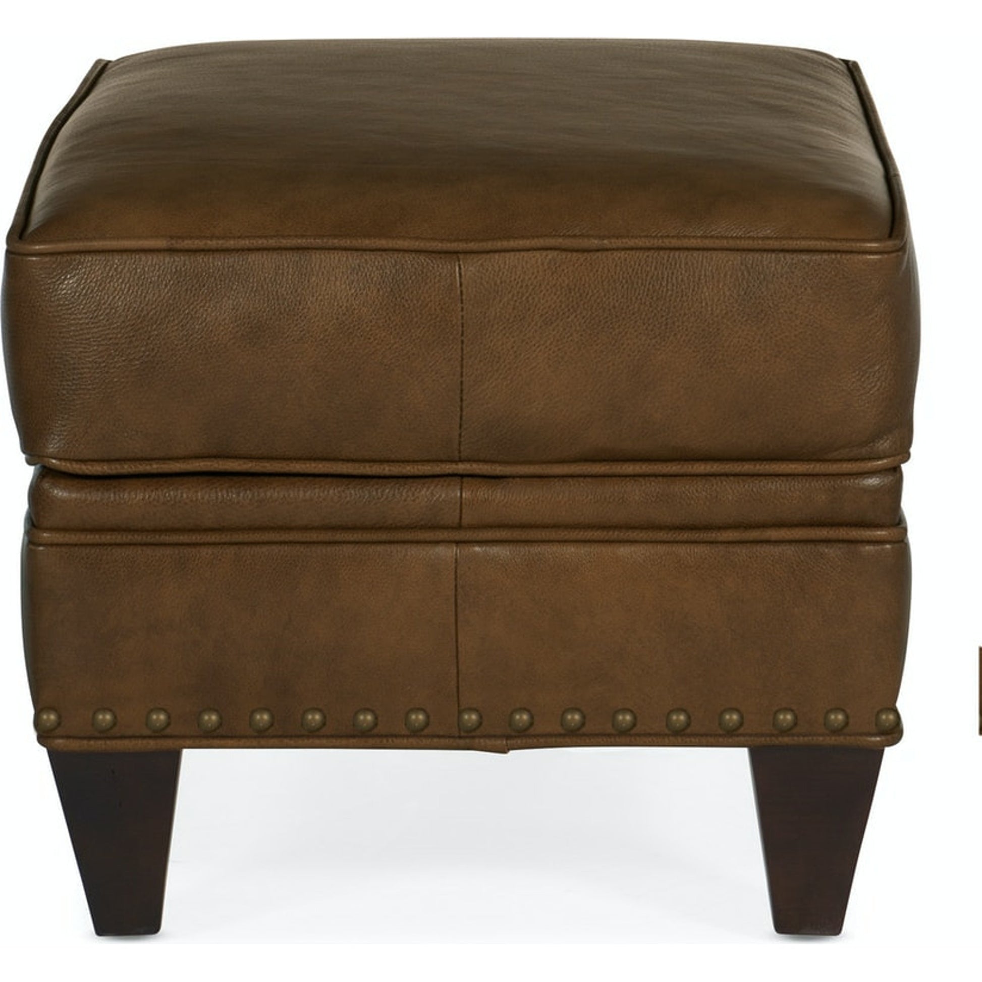 Carrado Ottoman by Bradington-Young by Hooker Furniture in brown and plantation finish, brass. Made from 100% leather in a unique style.