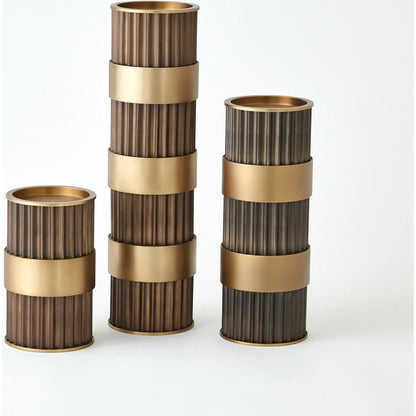 Magic Flute Cylinder Candleholder by Global Views in bronze. Made from unique in a modern style.