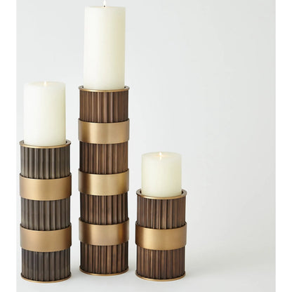 Magic Flute Cylinder Candleholder by Global Views in bronze. Made from unique in a modern style.