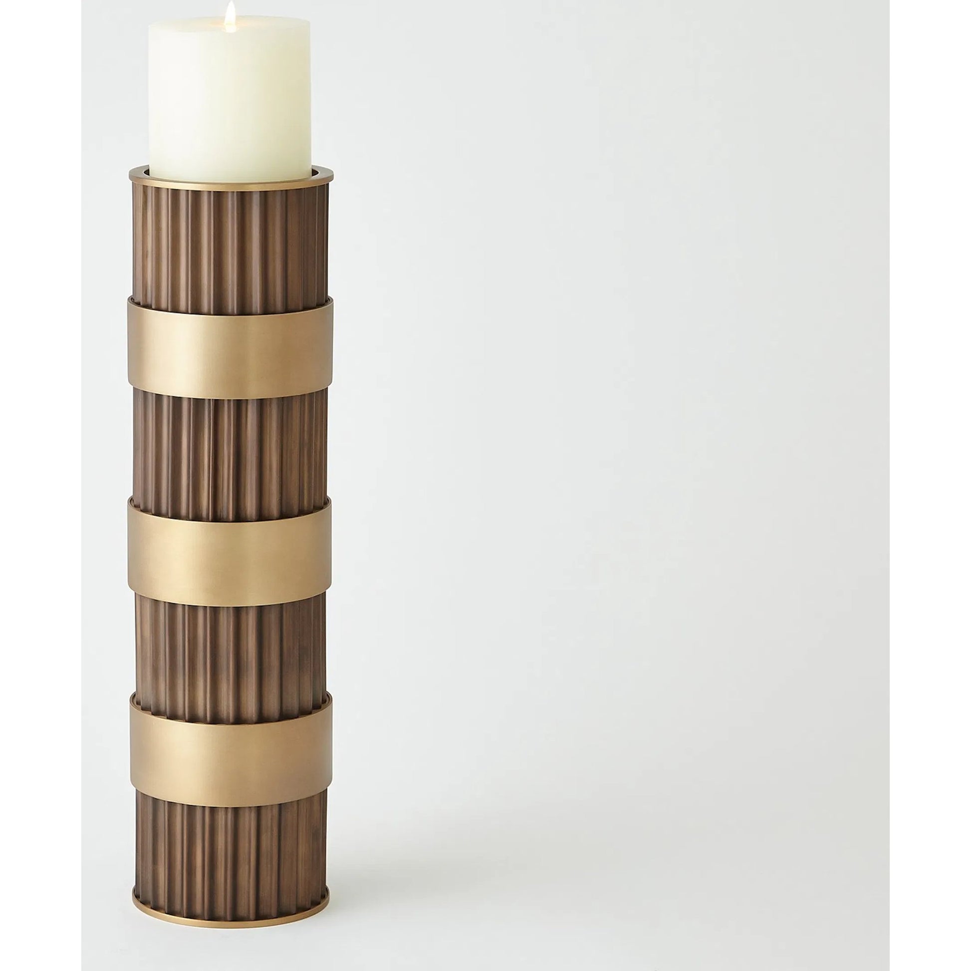 Magic Flute Cylinder Candleholder by Global Views in bronze. Made from unique in a modern style.