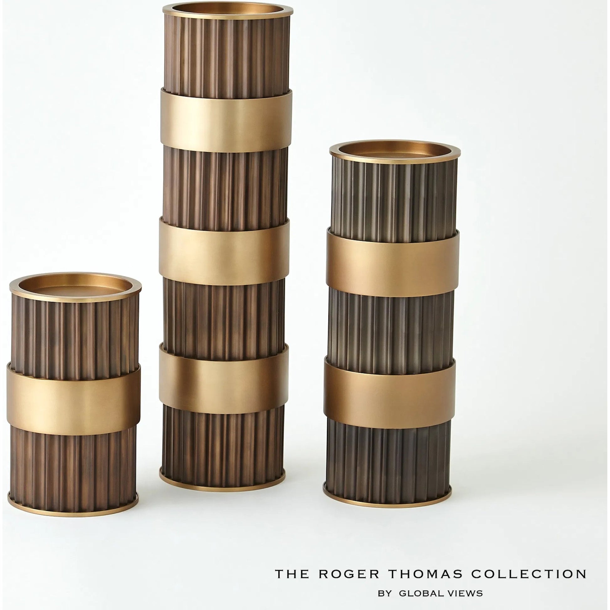 Magic Flute Cylinder Candleholder by Global Views in bronze. Made from unique in a modern style.