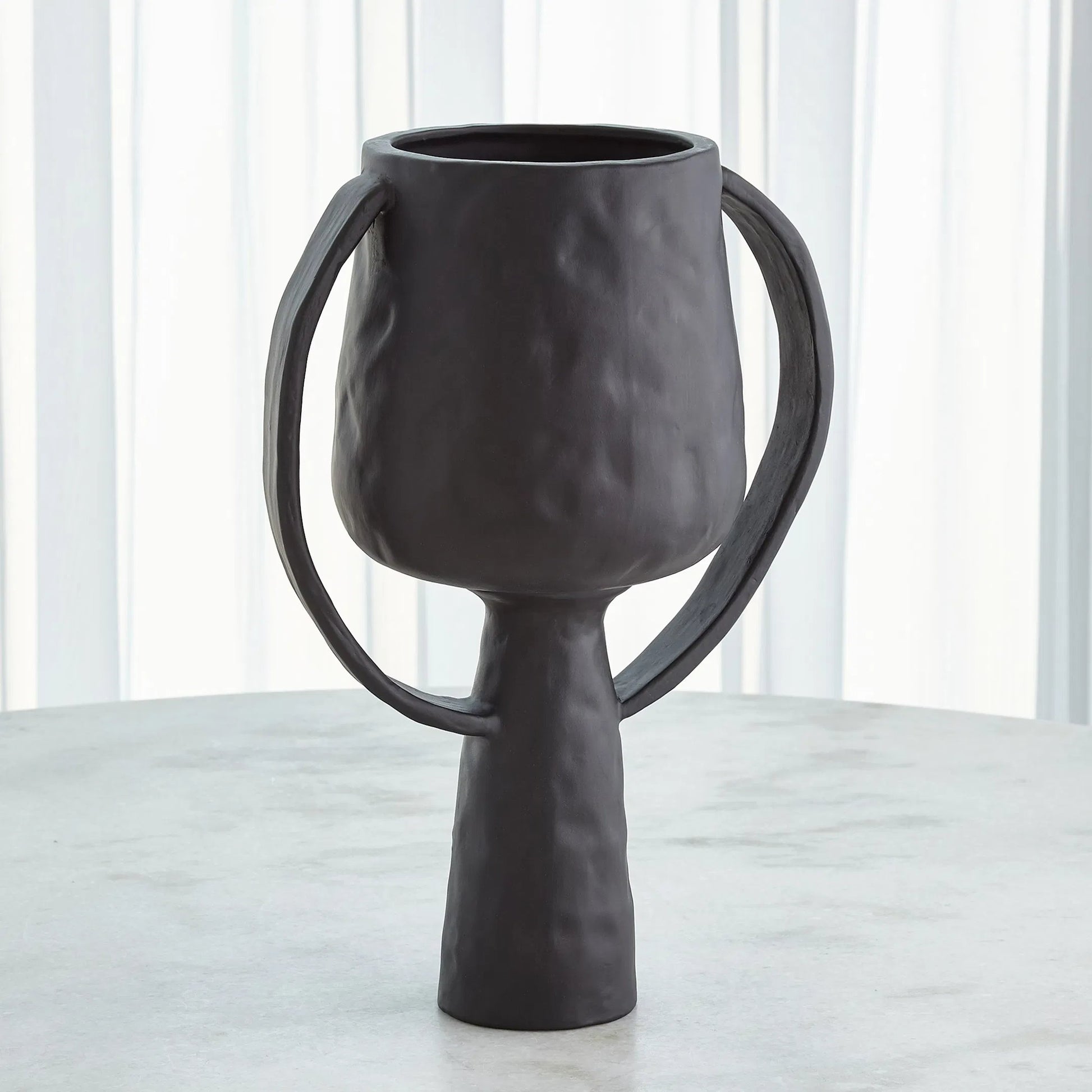 Aquitaine Vase by Global Views. Made from ceramic in a modern style.