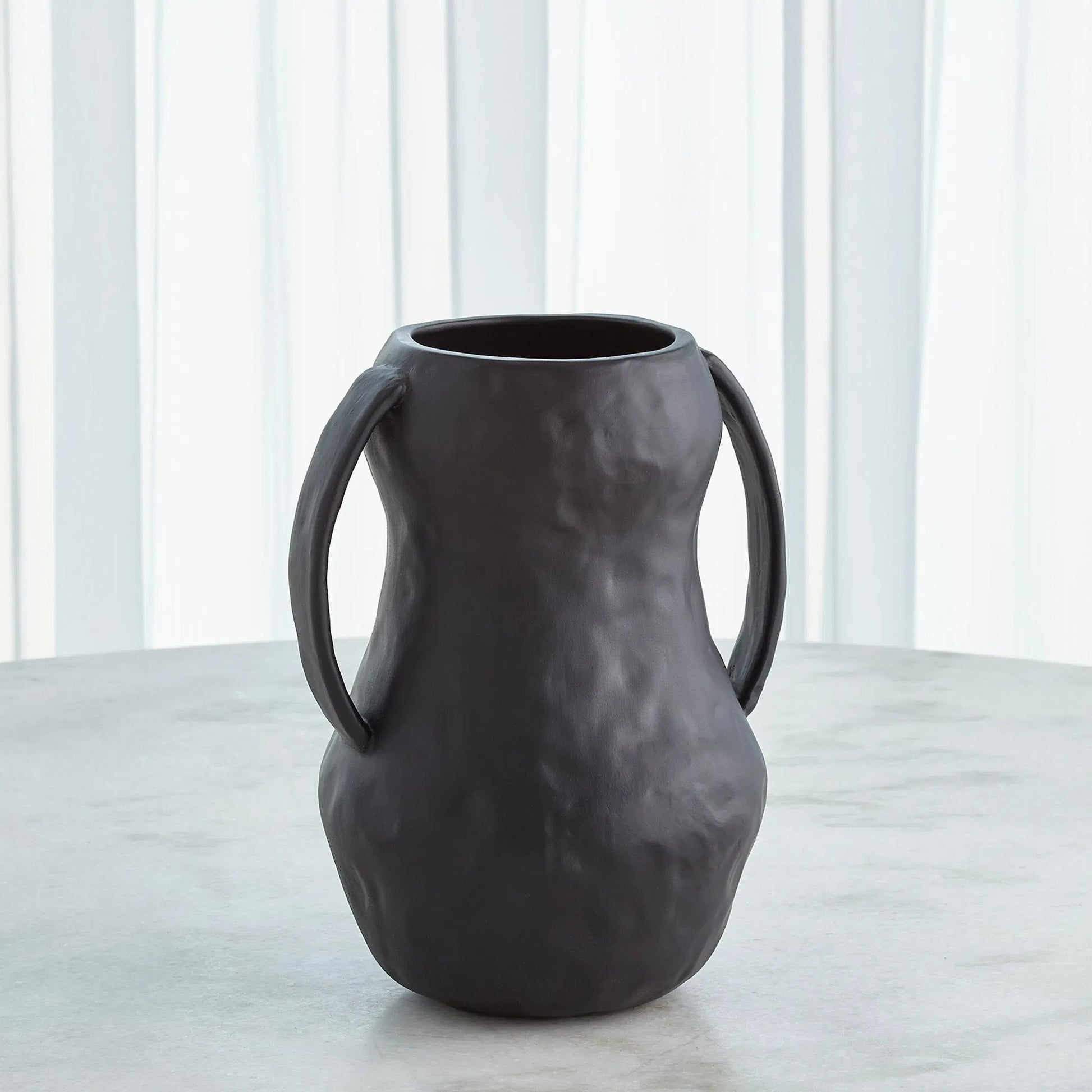 Aquitaine Vase by Global Views. Made from ceramic in a modern style.