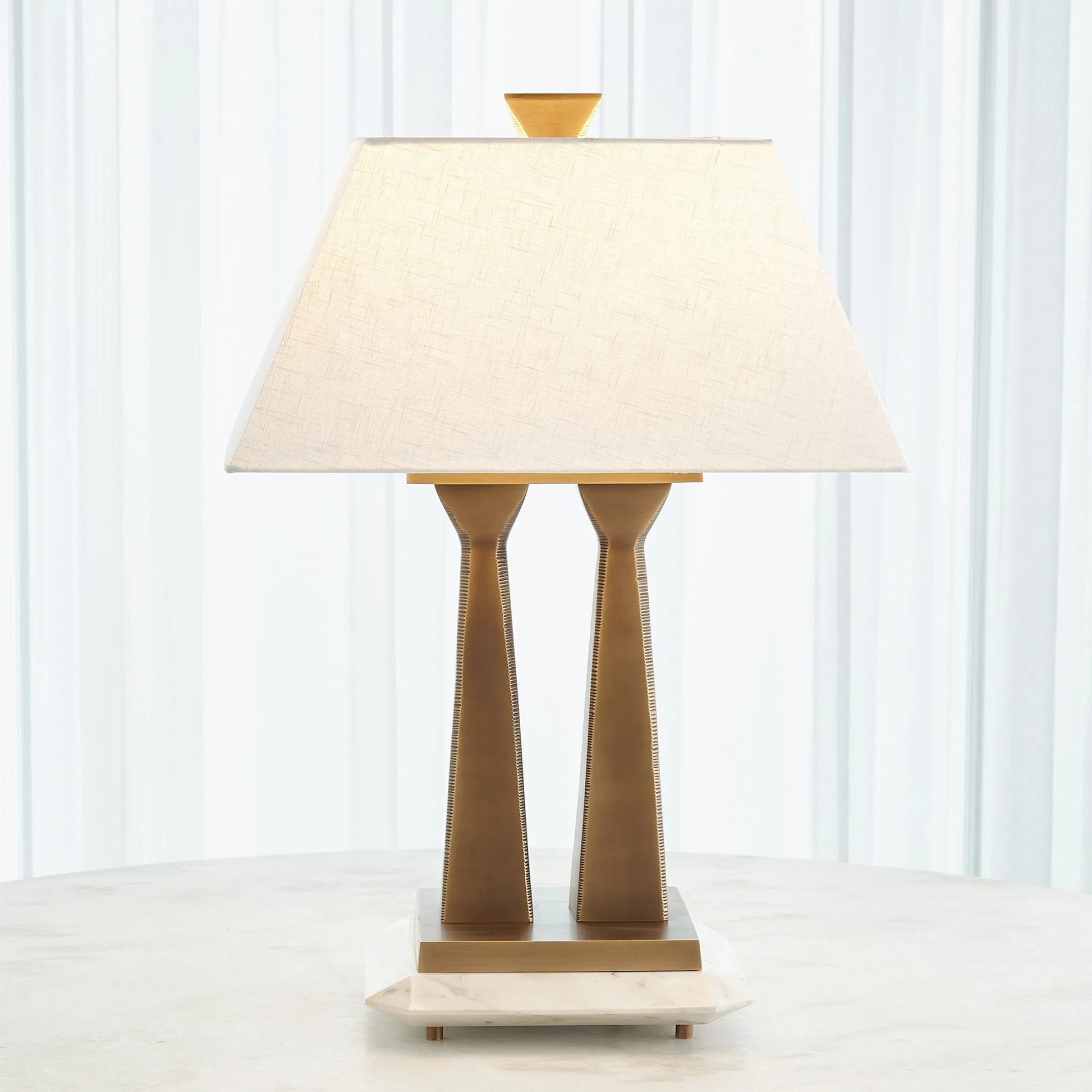 Capitol Table Lamp by Global Views. Made from brass, white marble in a traditional style.