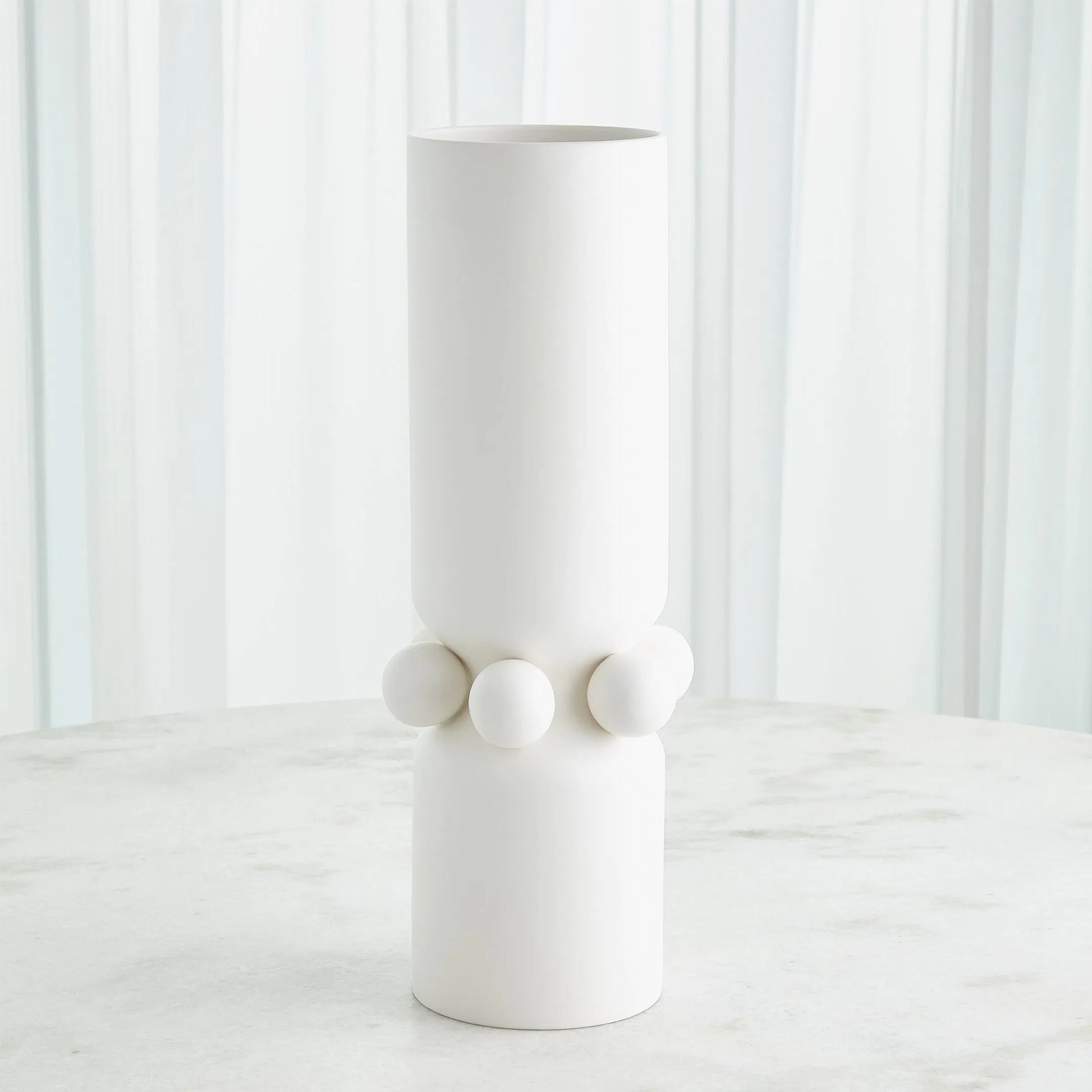 Hera Vase by Global Views. Made from ceramic in a eclectic & global style.
