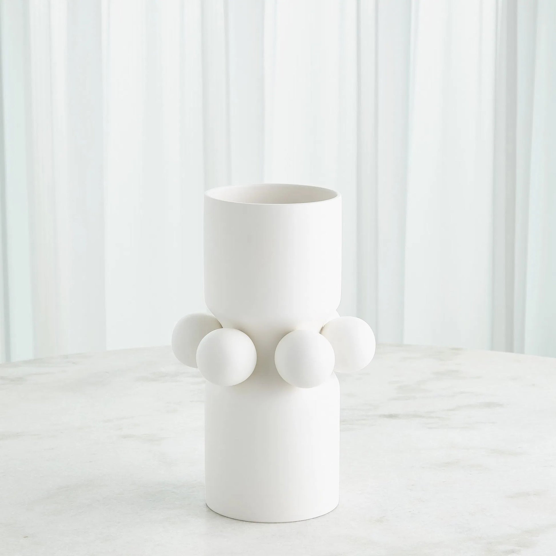 Hera Vase by Global Views. Made from ceramic in a eclectic & global style.