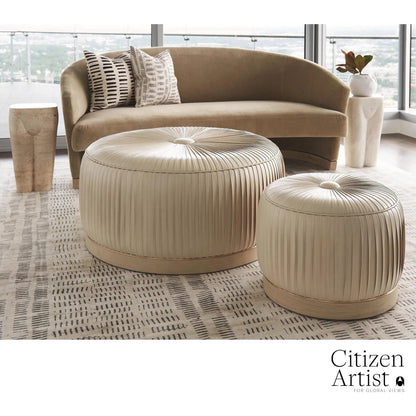 Colette Pouf by Global Views. Made from brass, leather in a modern style.