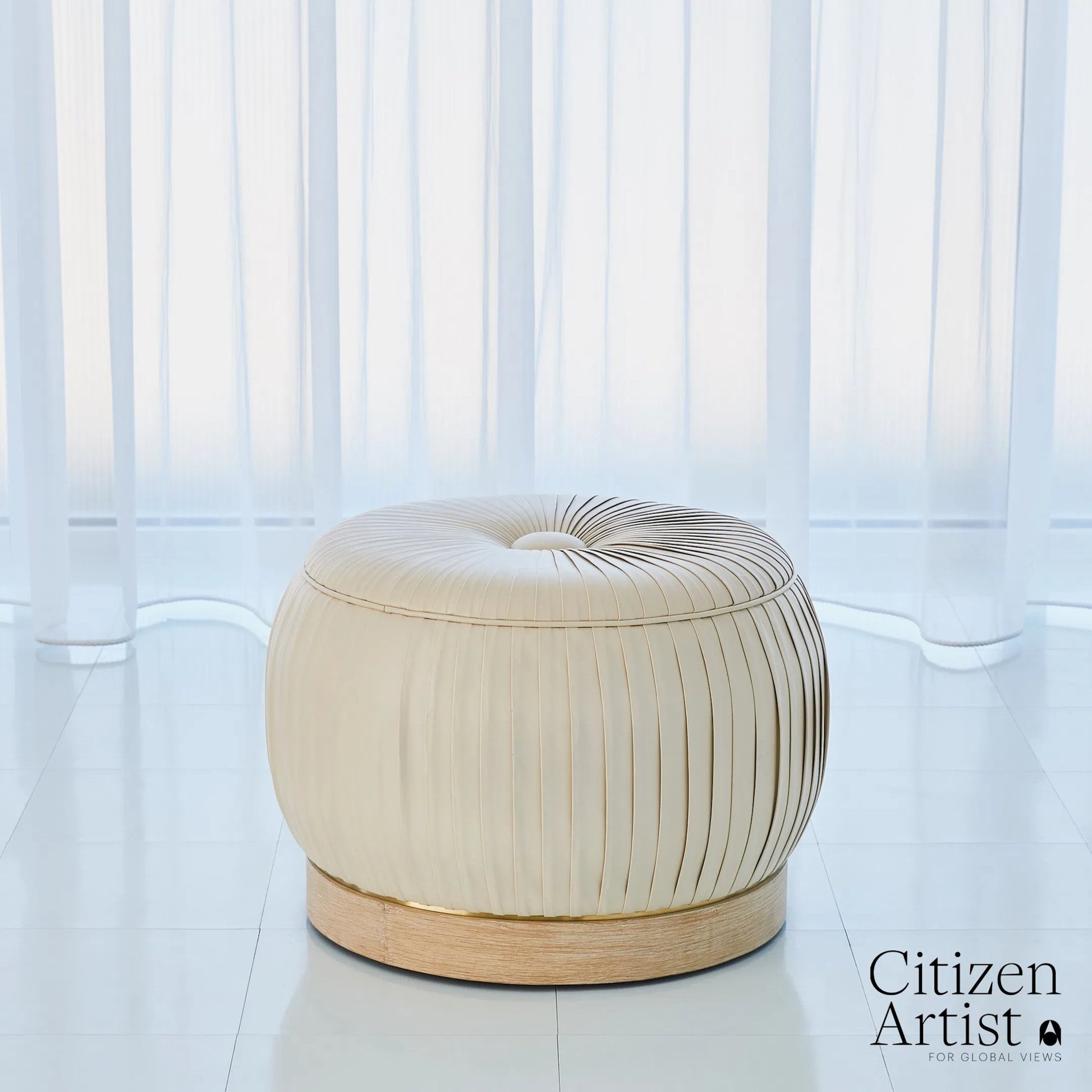 Colette Pouf by Global Views. Made from brass, leather in a modern style.