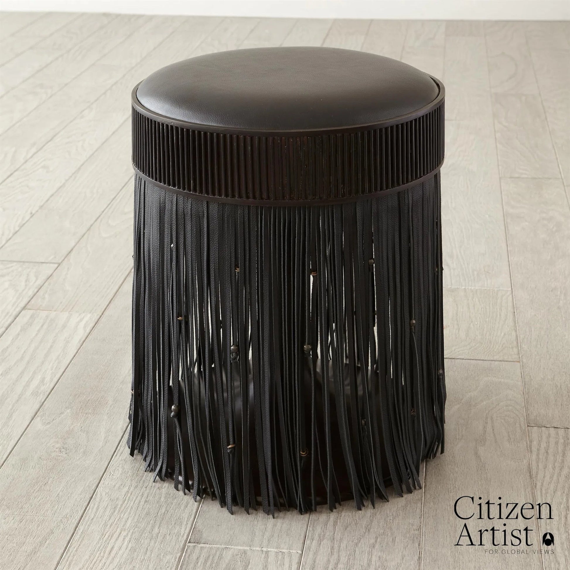 Grace Stool by Global Views in black. Made from brass, leather, mild steel in a eclectic & global style.