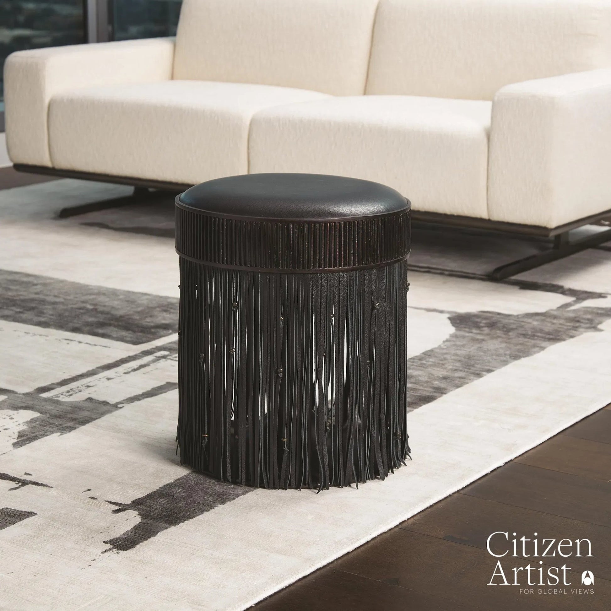 Grace Stool by Global Views in black. Made from brass, leather, mild steel in a eclectic & global style.