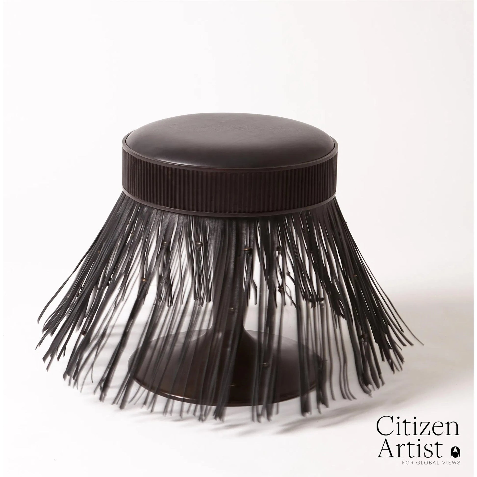 Grace Stool by Global Views in black. Made from brass, leather, mild steel in a eclectic & global style.