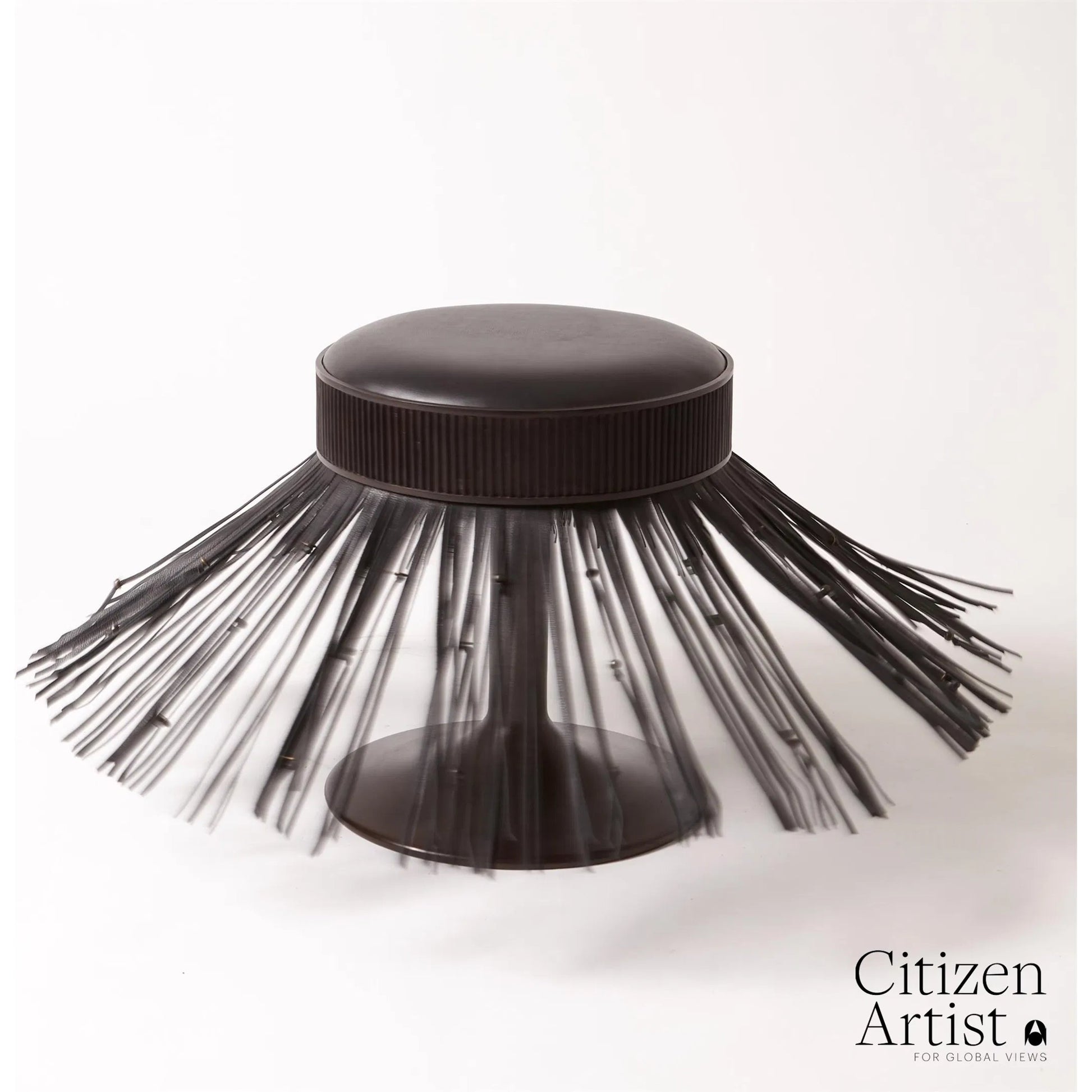 Grace Stool by Global Views in black. Made from brass, leather, mild steel in a eclectic & global style.