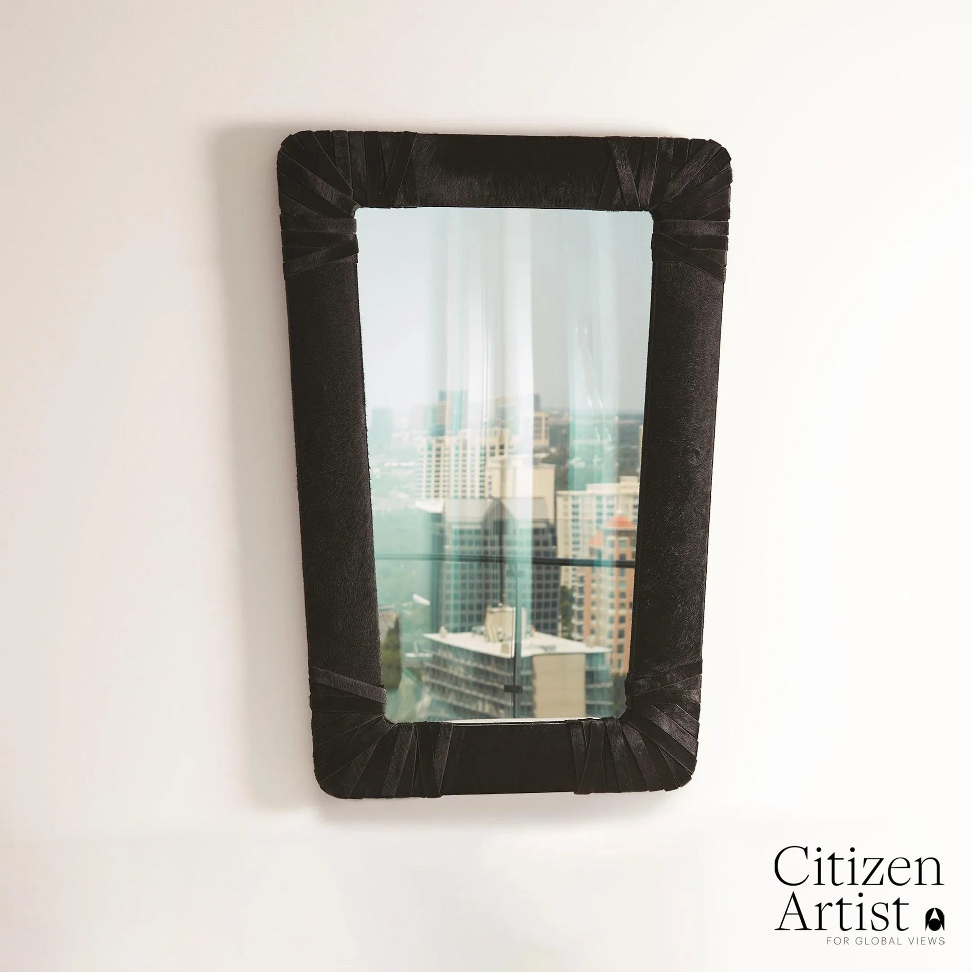 Gabriel Mirror by Global Views. Made from leather, mirror in a modern style.