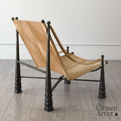 Cognac Chair by Global Views. Made from metal, cowhide in a rustic style.
