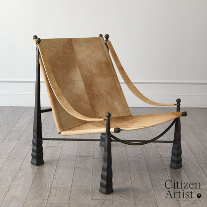 Cognac Chair by Global Views. Made from metal, cowhide in a rustic style.
