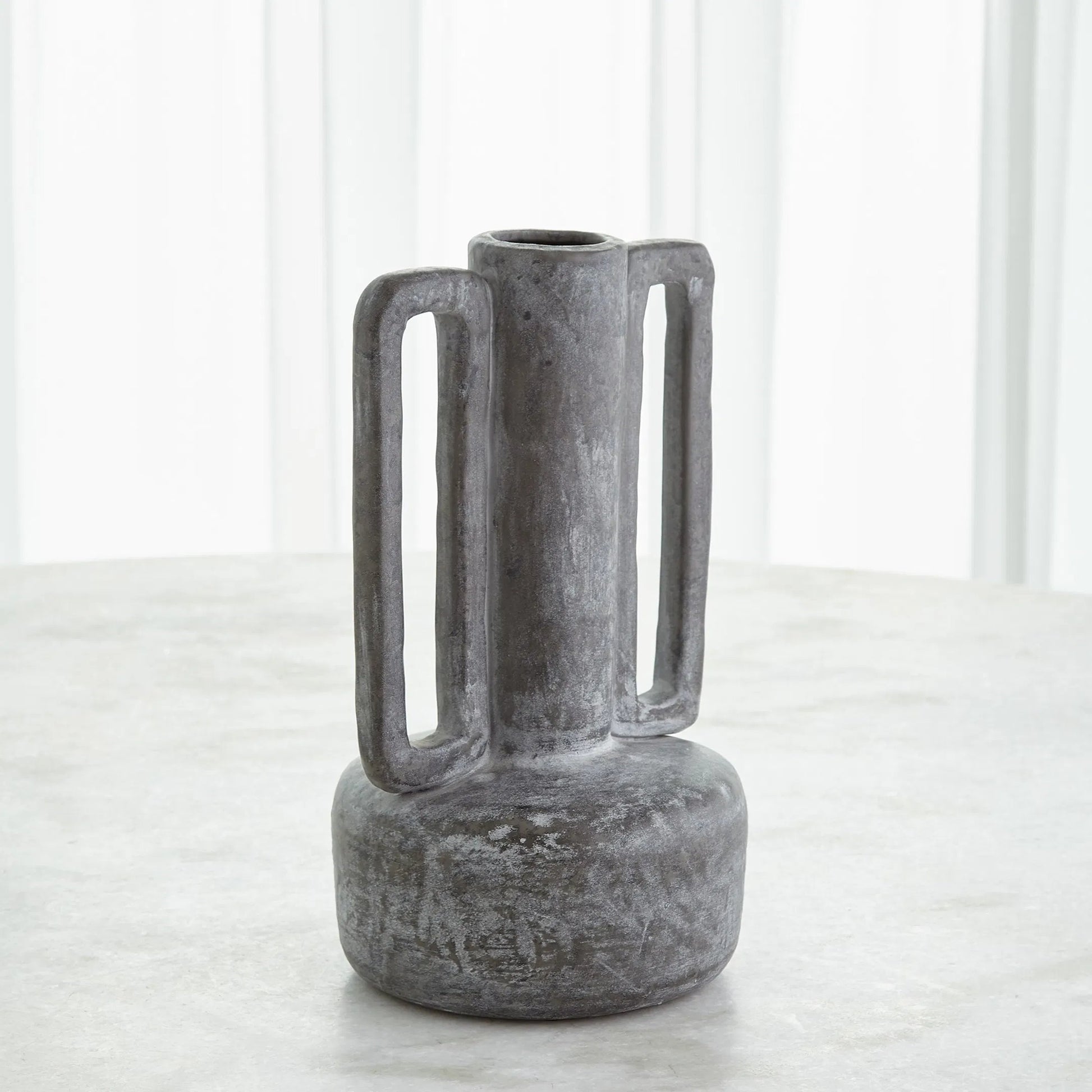 Normandie Vase by Global Views. Made from ceramic in a modern style.
