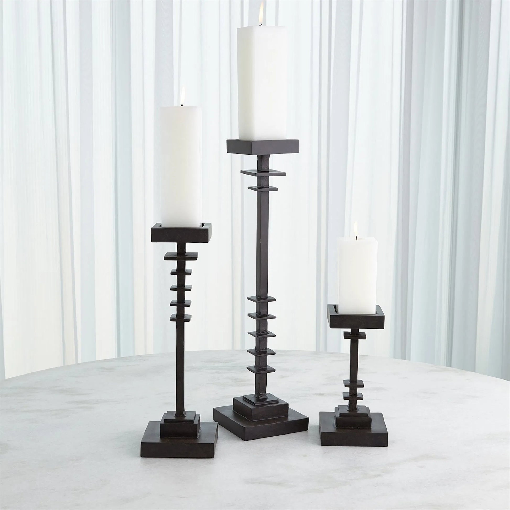 Corentin Candle Holder by Global Views. Made from unique in a traditional style.