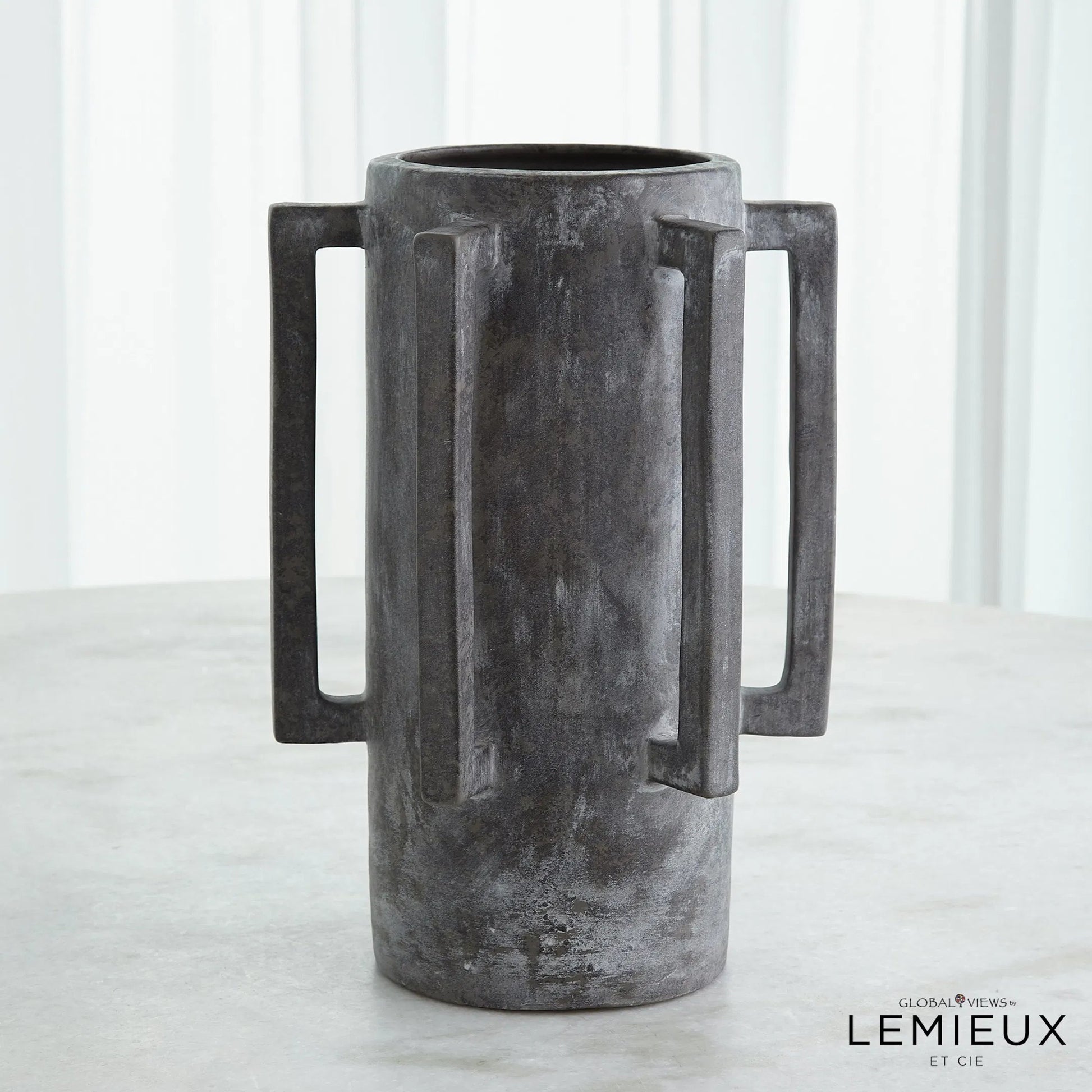 Normandie Vase by Global Views. Made from ceramic in a modern style.