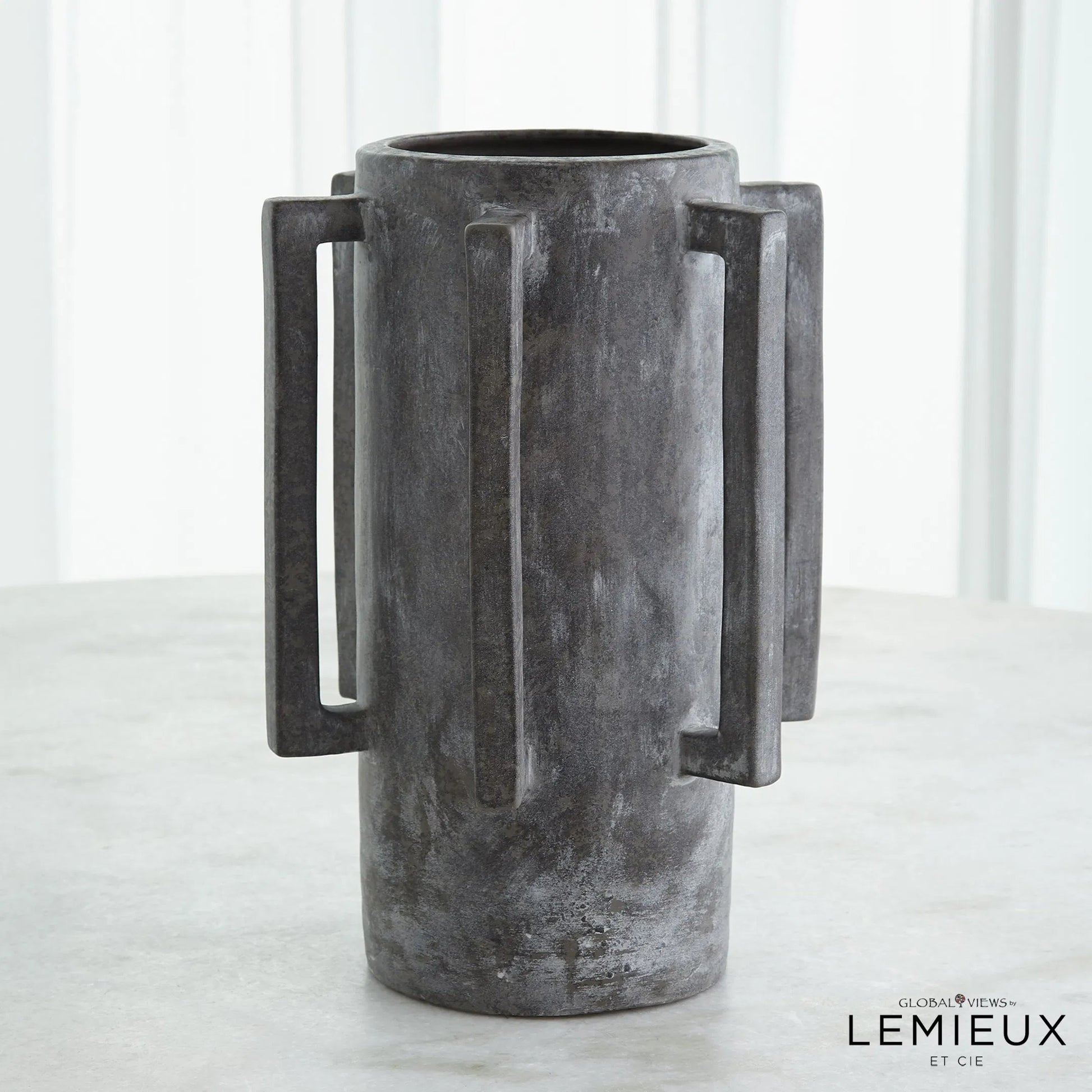Normandie Vase by Global Views. Made from ceramic in a modern style.