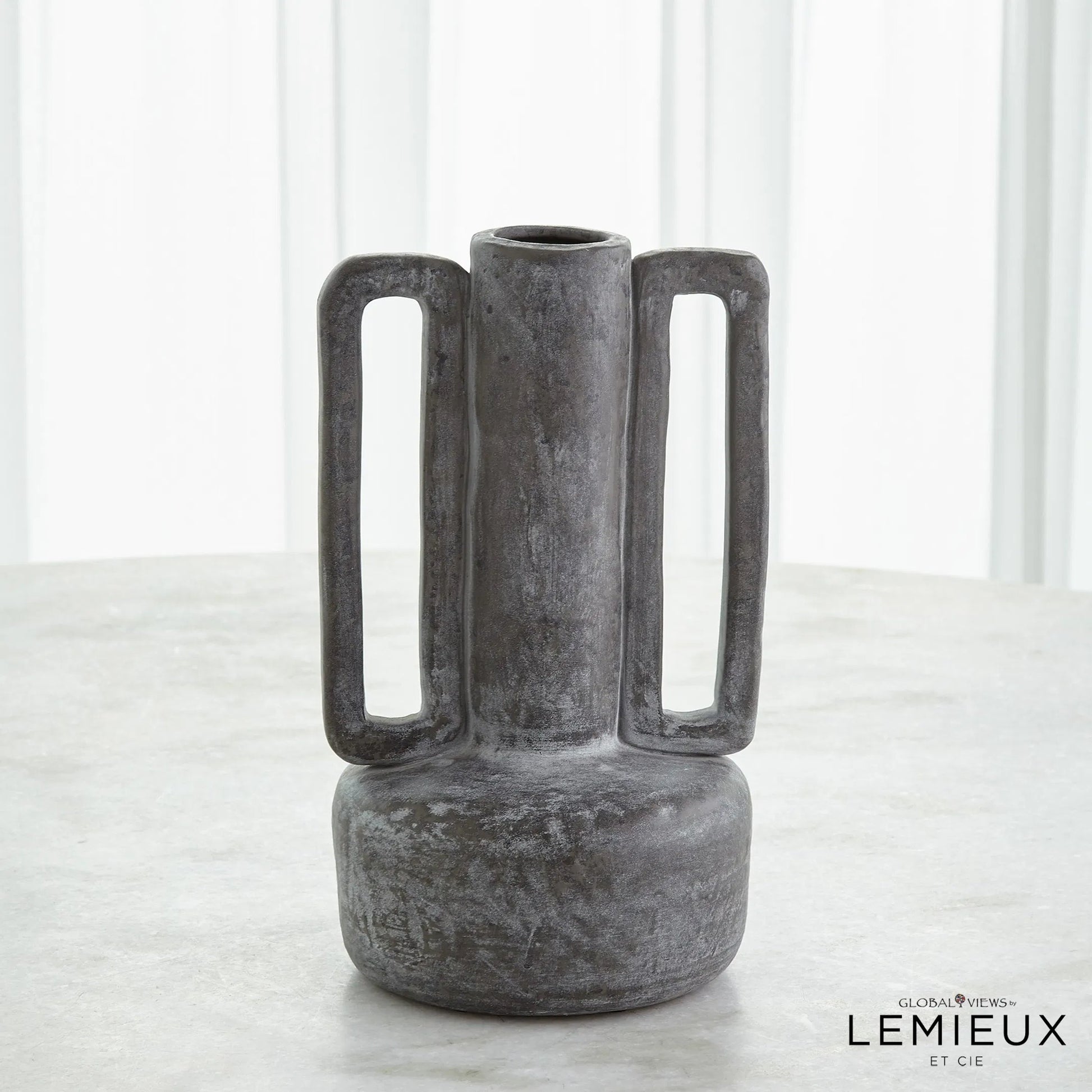 Normandie Vase by Global Views. Made from ceramic in a modern style.