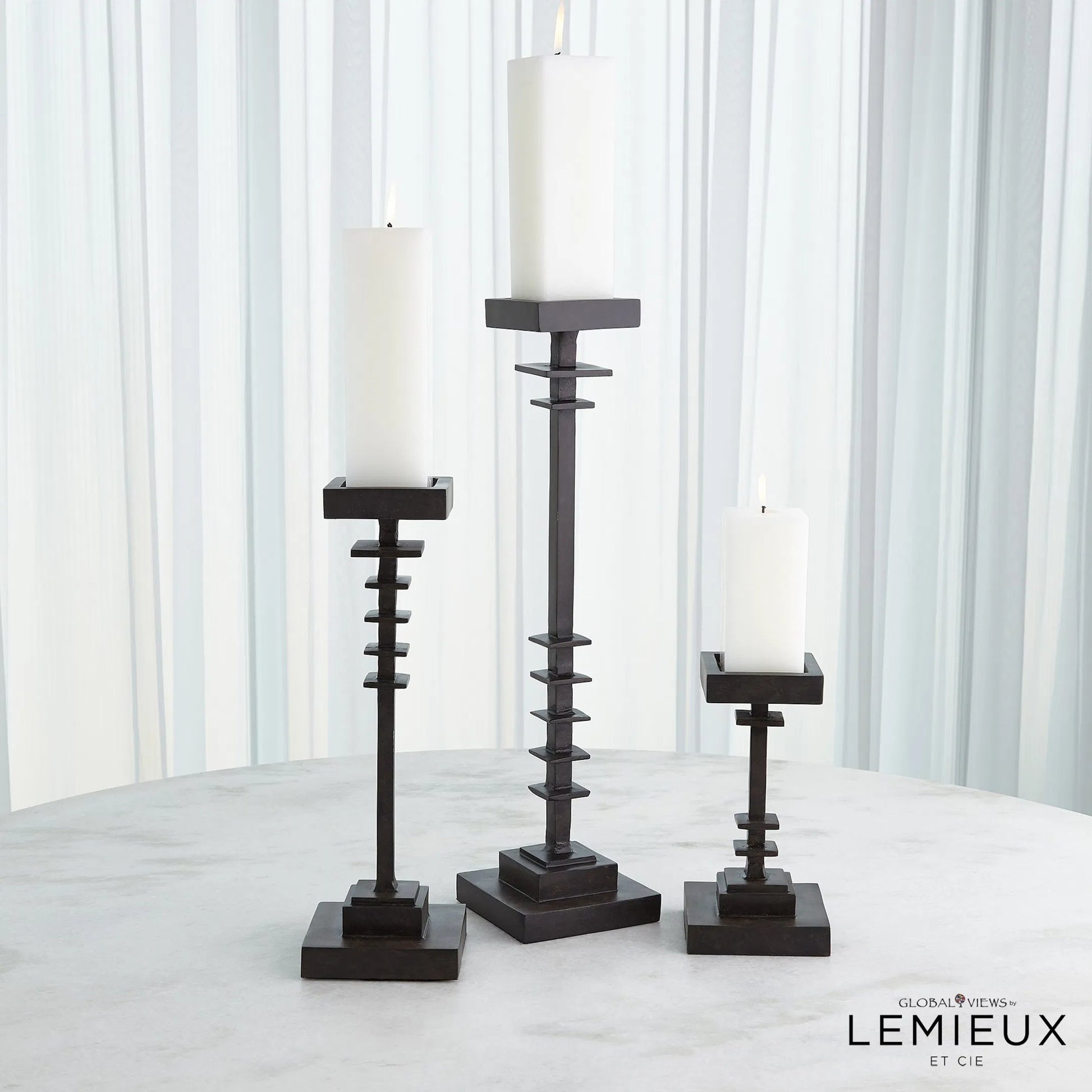 Corentin Candle Holder by Global Views. Made from unique in a traditional style.