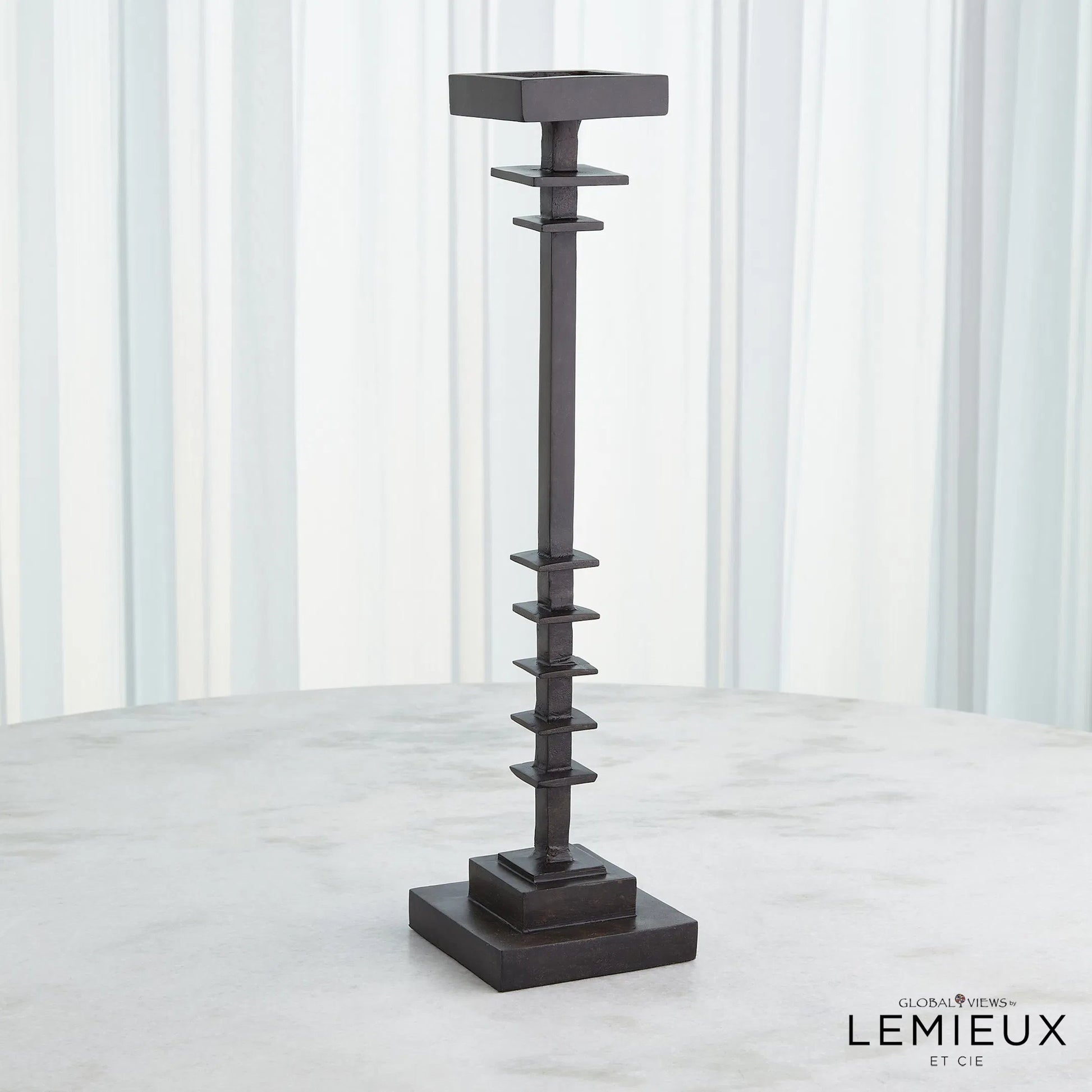 Corentin Candle Holder by Global Views. Made from unique in a traditional style.