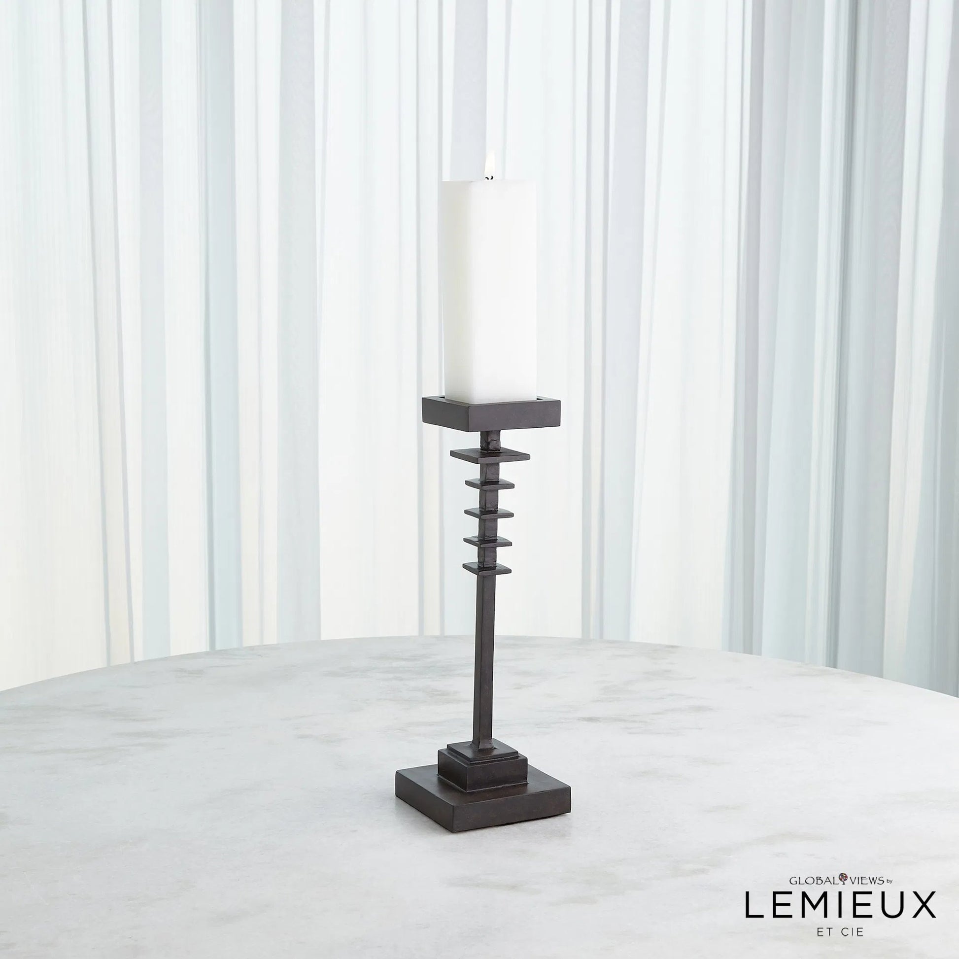 Corentin Candle Holder by Global Views. Made from unique in a traditional style.