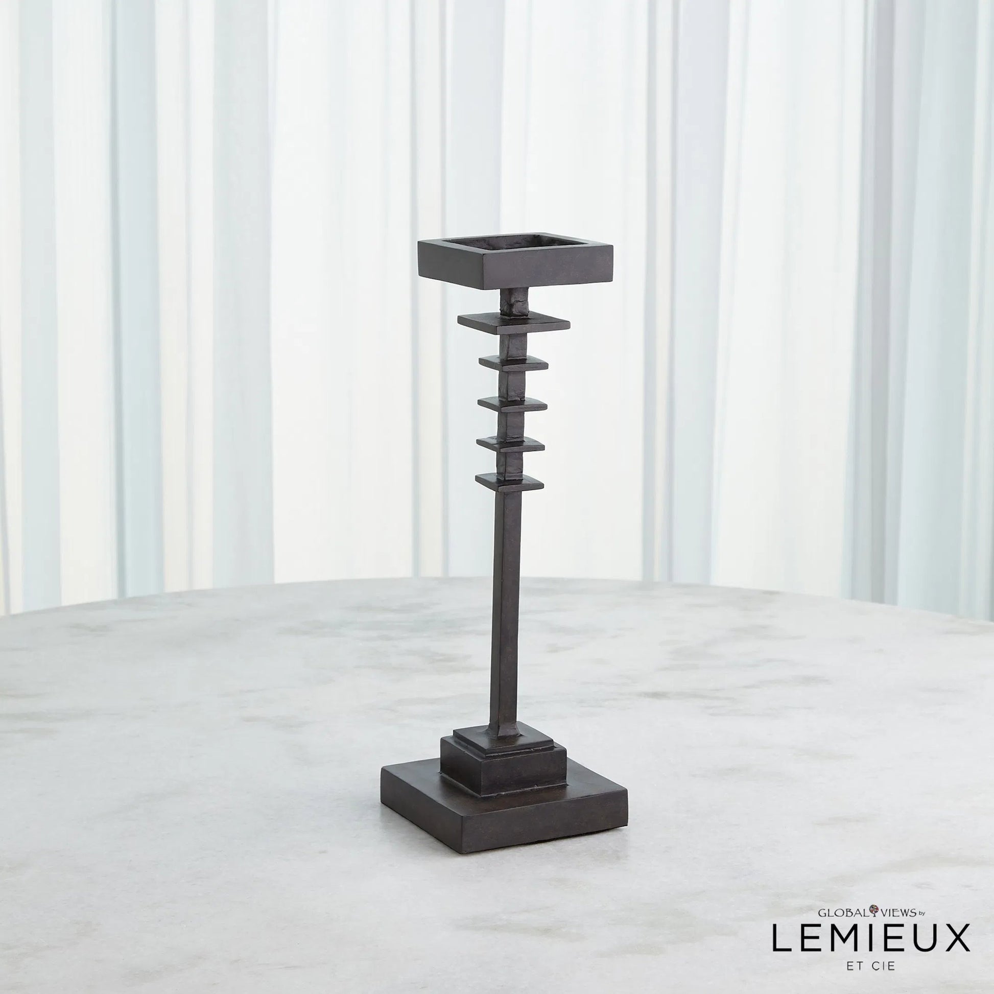 Corentin Candle Holder by Global Views. Made from unique in a traditional style.