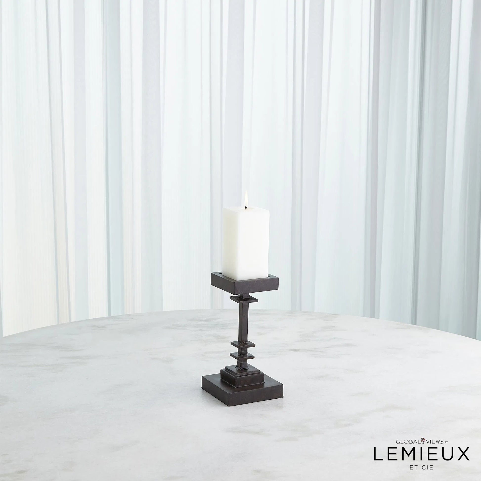 Corentin Candle Holder by Global Views. Made from unique in a traditional style.