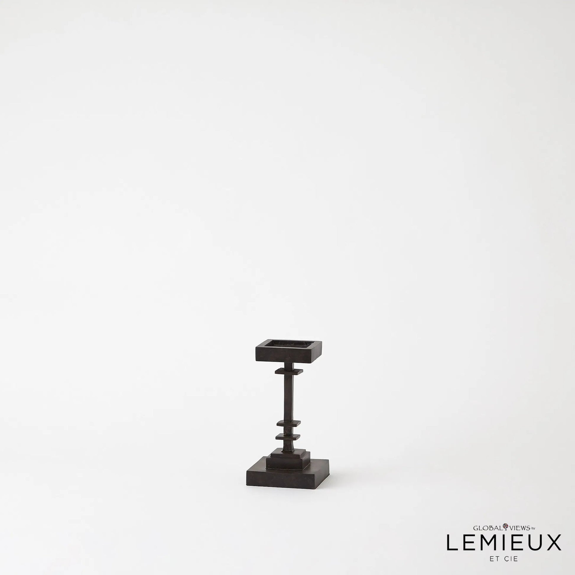 Corentin Candle Holder by Global Views. Made from unique in a traditional style.