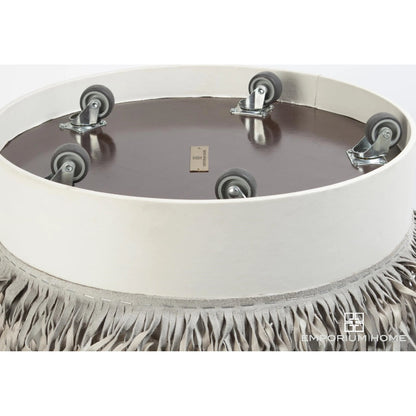 Fringe Ottoman by Global Views. Made from mdf, leather, pvc in a unique style.