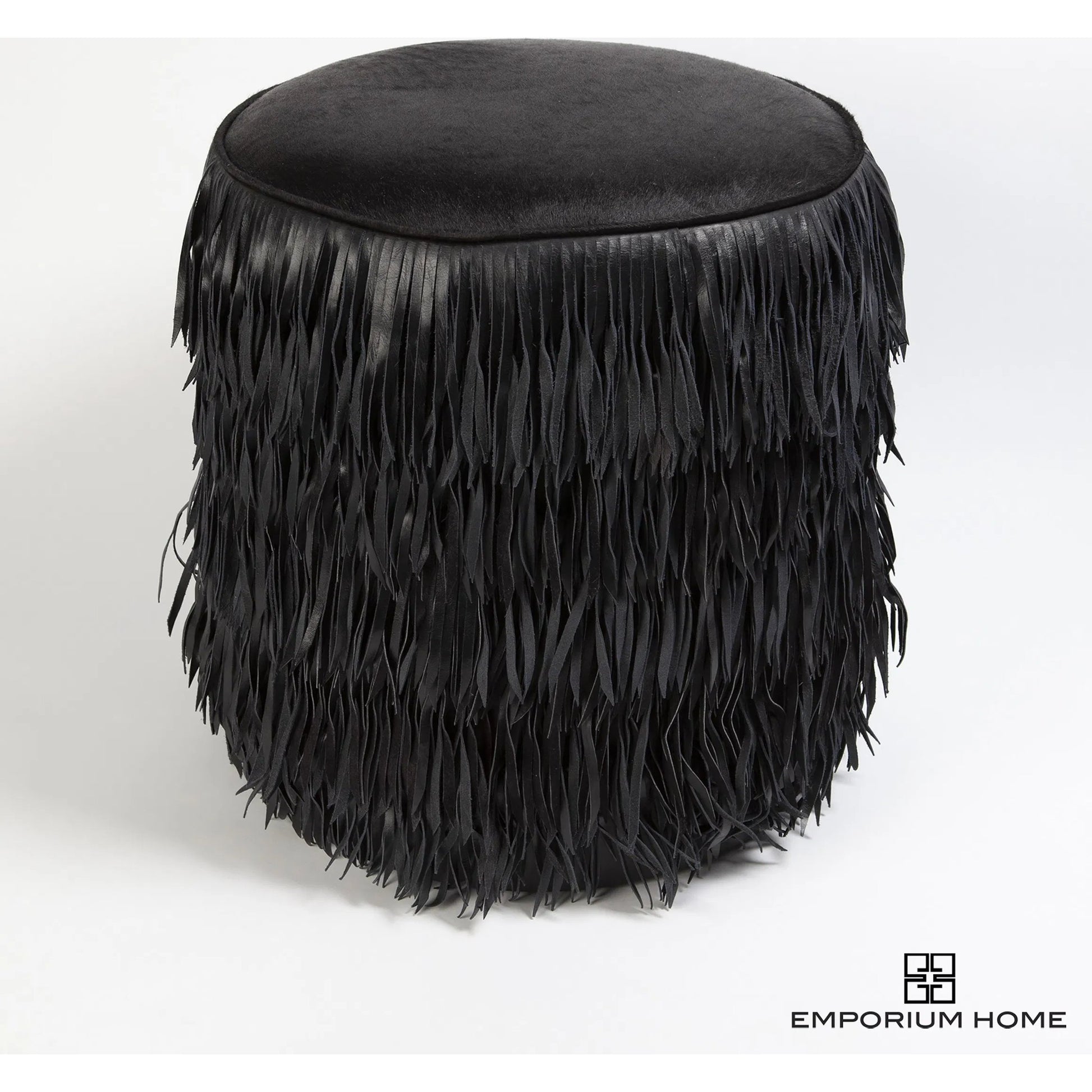 Fringe Ottoman by Global Views. Made from mdf, leather, pvc in a unique style.