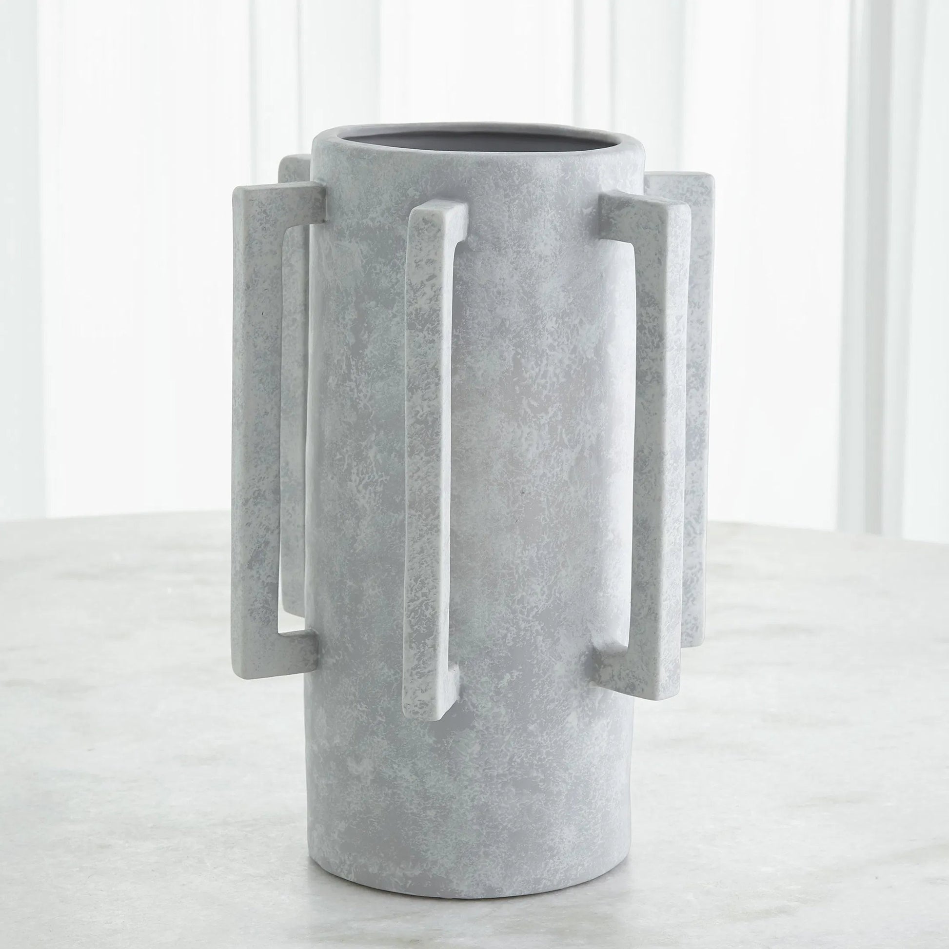 Normandie Vase by Global Views. Made from ceramic in a modern style.